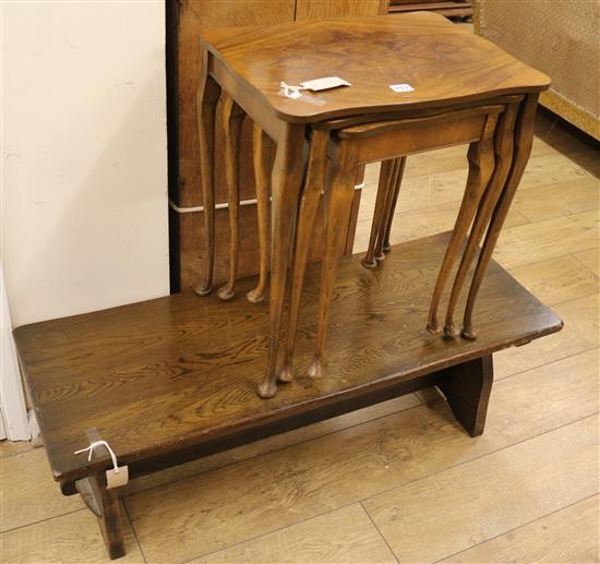 An Ercol coffee table and a nest of three walnut tea tables, W.107cm. Nest W.50cm